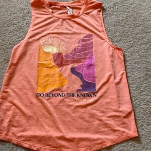 Peloton “Go Beyond the Known” tank. (M)